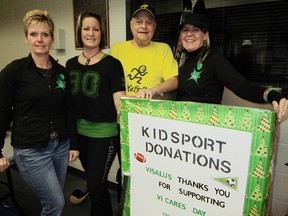 Visalus agent Janine Mandryk of Simcoe, right, is spearheading a drive between now and Dec. 15 to round up good used sports equipment for needy kids in the Norfolk area. Aiding Mandryk in the effort, from left, are Tracey Stewart of Delhi, Kelly Lammens-Pickard of Langton and Doug Souilliere of Port Dover, chair of KidSport in Norfolk County. (MONTE SONNENBERG Simcoe Reformer)