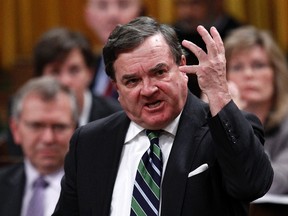 Finance Minister Jim Flaherty speaks during Question Period in the House of Commons on Parliament Hill, October 18, 2012. (REUTERS/Chris Wattie)