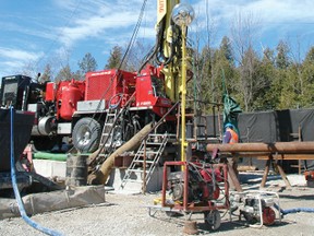 A drill rig extracts core samples from the depths of proposed 680-metre Deep Geologic Repository at the Bruce nuclear site. (QMI Agency file photo)