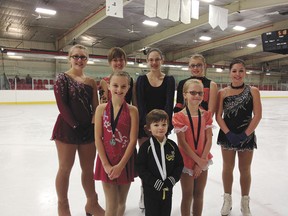 Several members of the Devon Skating Club hit the ice at the Edmonton Region Open Competition in Spruce Grove this past weekend, many of whom came home with shiny new medals for their trophy rooms. 
“Competitors worked very hard preparing for this competition where they competed against clubs from Edmonton and area as well as skaters from Northern and Central Alberta”, said Skating Club president Shan Tebb.
Club members competed in three categories, introductory elements, preliminary elements, and preliminary free skate, earning five gold medals, three silver medals, two bronze medals and two 6th place awards. 
Tebb thanked the skater’s coaches and parents as well.
Back row: 
Kendra Tebb, Amanda Pittman, Katie Doucette, Amanda McLaughlin and Randi Mattson
Front row:
Autumn Bergestreiser, Nikolai Balabardin and Chloe Drader