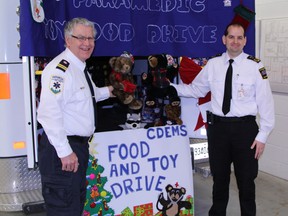 Timmins EMS representatives AJ Zimmerman, left, and Derrick Cremin say they're confident the generosity of Timmins residents will shine through on Saturday. Timmins Times LOCAL NEWS photo by Len Gillis.