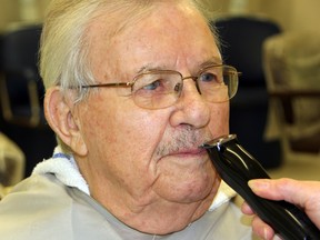 Harry Attwater, 89, had his very first moustache shaved off in Sarnia, Ont. on November 30, 2012. Attwater decided to grow his facial hair for the month of November to raise money for the Canadian Cancer Society. (TARA JEFFREY, The Observer)