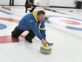 Ralph Erdell of the Giebelhaus rink  fires the stone down the sheet in mixed curling action at the Mayerthorpe Curling Rink on the evening of Wednesday, Nov. 28. Mixed curling is held Wednesday and Thursday nights while men's curling is held on Tuesday nights.