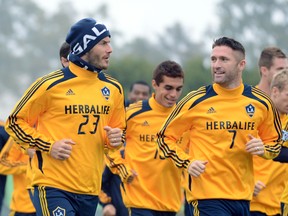 David Beckham #23 and Robbie Keane #7 of the LA Galaxy warm up in preparation for the 2012 MLS Cup at The Home Depot Center on Nov. 29, 2012 in Carson, Calif. (Harry How/Getty Images/AFP)