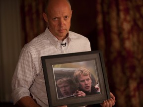 Eric Windeler holds a photo of his son Jack.