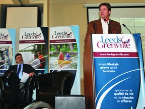 Bill Rogerson of the Aquatarium speaks at the Leeds-Grenville Economic Development Summit on Friday. Tom Lawler, left, of Eagle Point Winery and Robert Dalley of the Port of Prescott look on (ALANAH DUFFY/The Recorder and Times).