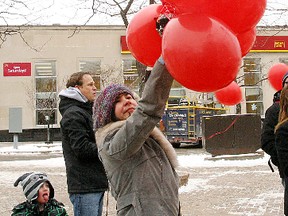 AIDS Committee of North Bay and Area released balloons downtown to mark World AIDS Day on Saturday. (MARIA CALABRESE The Nugget)