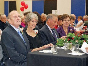 An event honouring the achievements and contributions of lifetime Vulcan resident David Mitchell was held at the Cultural-Recreational Centre on Saturday night. The event was sold out, with 200 people attending. Here, Mitchell and his wife Bev listen as organizer Lisa Wylie kicked off the evening shortly before supper. The evening also served to raise funds for local charities and organizations.

Simon Ducatel/Vulcan Advocate