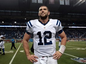 Indianapolis Colts quarterback Andrew Luck gets ready for an interview on the field after defeating the Lions in Detroit on Sunday. (REUTERS)