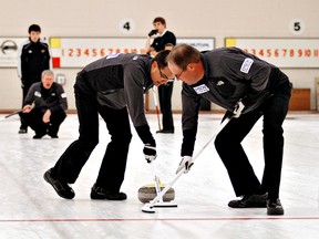 Kara Wilson, for The Expositor

Shawn Kaufman (right) and Jeff Gorda of Team Frans sweep a rock during the final Sunday of the Nissan Classic at the Brant Curling Club. The Bradford rink defeated Aylmer's Bowie Abbis-Mills.