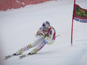 American Lindsey Vonn rounds a turn during the women's super-G at the Lake Louise Winterstart World Cup race on Sunday. Vonn finished first with a time of one minute 22.82 seconds. It was her third win of the weekend after championing downhill races on Friday and Saturday. Justin Parsons/ Canmore Leader/ QMI Agency