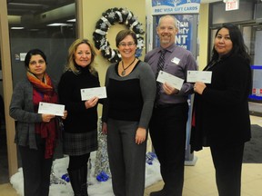 Staff at the Royal Bank donated a total of $2,000 to the local Big Brothers, Big Sisters organization in Portage la Prairie.  (Jordan Maxwell/Portage Daily Graphic/QMI Agency)