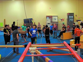 Parkour athletes and those interested in taking up the sport gathered at an open house last month showcasing the new equipment and training facility for the emerging free-running sport. Photo supplied.