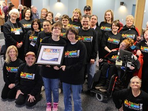 Staff and students of the H'Art School accept Kingston's 2012 Access Award Monday.
Elliot Ferguson The Whig-Standard