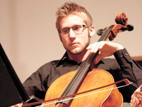 Canadian University College (CUC) student and cello player, Joel Brousson, performs November 24, 2012, during CUC's FunFest activities on campus. (CONTRIBUTED/LACOMBE GLOBE)