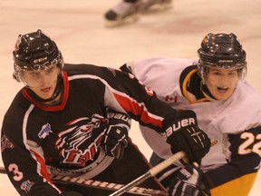 Soo Thunderbirds defenceman Fraser Turner gets tangled up with Everett Thompson of the Kirkland Lake Gold Miners during Northern Ontario Jr. Hockey League action from Sunday at the Essar Centre. The teams played to a 2-2 tie. Next home-ice action for the first-place Thunderbirds is Saturday at 7:30 p.m. when they play host to the Abitibi Eskimos.