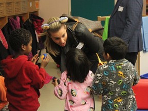 The Bear radio personality Gillian Foote talks to Tipaskan school kindergarten students during last week’s teddy bear’s picnic that honoured the Edmonton Public School Foundation. DALE BOYD Special to the Examiner