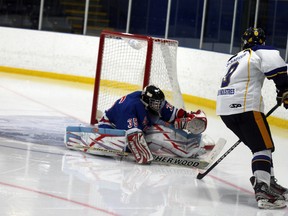 Rangers goalie Micah Bonneville makes a big save in Sunday night’s game. 
Photo by Trevor Howlett/QMI Agency