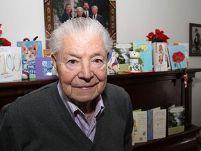 Cards for his 100th birthday on Thursday line the top of the piano in the home of Danylo Luciuk, who emigrated from Ukraine in 1949 and has championed the cause of Ukrainian independence since then. (Michael Lea/The Whig-Standard)