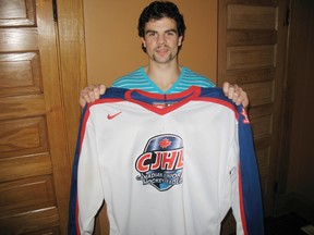 Delhi native, Adam Brady, shows off the jersey he received following the Canadian Junior Hockey League’s prospects game he played in on Nov. 10 and 11 in Nova Scotia. (SARAH DOKTOR Simcoe Reformer)