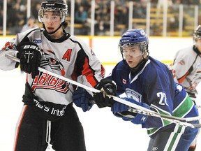 Soo Thunderbirds Adam Ritchie, left and Sudbury Nickel Barons August Jarecki fight for position during first period NOJHL action from the McClelland Arena on Wednesday night.
GINO DONATO/THE SUDBURY STAR