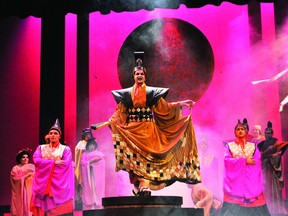 The title character of The Mikado, played by Joshua Clayton, makes his imperial entrance during a dress rehearsal of the St. Lawrence College music theatre performance program's production of the Gilbert and Sullivan classic on Wednesday. The opera opens tonight at the Brockville Arts Centre. RONALD ZAJAC The Recorder and Times