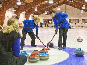 Vice Michelle Boucher calls the line as sweepers Julie Rickard (left) and Maureen Allore guide McKue's first eighth end rock into the pocket for the eventual win during Mathew Jeffs, Marine Contractors Thursday Night Cash League play at Trenton Curling Club. Opponent Mike Parry looks on in dismay.
