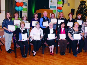 photo credit:  SEAN CHASE sean.chase@sunmedia.ca
Renfrew County residents were recognized with "Heroes in the Home" Caregiver Recognition Awards handed out by the Champlain Community Care Access Centre. In the photo is (front left to right) Doreen Gutoskie, Mary Lowell, Joan-Marie Potvin, Eid Mookprom, Dorothy Carignan, Jean Weeks, Nora Snider, Brian Snider, (back left to right) Kareen Rekowski, Fran Pinkerton, Aleksandra Czapla, Patricia Whitfield, Tony Contant, Rhoda Caldwell, Petra Van Hoof, Heather Denvir, Mary Prince and Bonnie Mask.