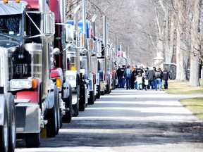 A procession of semi-trucks marked the final run of Waylon Dorner to Maple Leaf Cemetery, Thursday, December 06, 2012. Dorner, who was part of the family run business, Waylon Dorner trucking, died suddenly last Friday.  DIANA MARTIN/ THE CHATHAM DAILY NEWS/ QMI AGENCY