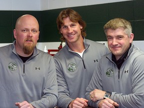 From left: Edmonton Oilers assistant equipment manager Brad Harrison, Ryan Smyth and Oilers head equipment manager Jeff Lang open up the new Smytty’s Edge skate-sharpening shop in Millennium Place last Sunday. Photo by Shane Jones/Sherwood Park News/QMI Agency