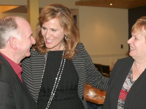 Former Chatham-Kent-Essex MPP Pat Hoy and his wife Debbie share a laugh with Sandra Pupatello, who is running for the leadership of the Liberal Party of Ontario. Pupatello visited with party members at the Satelitte Restaurant in Chatham on Friday, Nov. 30, 2012. (QMI Agency)
