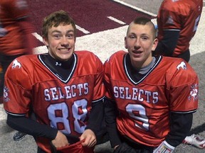 Des Catellier, right, and Evan Perrault, of the Cochrane Bantam Lions, played for the Calgary Selects in the Pilgrim Bowl in Belleville, Illinois last month. The team went 3-0.