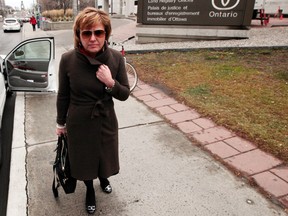 Dr. Christy Natsis walks out of the Ottawa Court house during a break in her drunk driving trial Monday, Dec. 3, 2012. Darren Brown/Ottawa Sun/QMI Agency