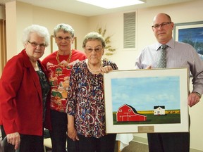 MLA Fred Bradshaw congratulates Pioneer House residents