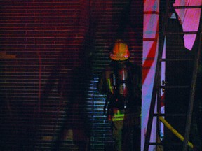 Firefighters had to cut through the roof of a Machin Street home in Kenora Thursday night to get at a fire in the attic and walls.
JON THOMPSON/Daily Miner and News