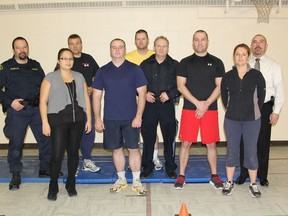 OPP officers participated in fitness training at the Apitisawin Centre last week. Front (l-r) Sandy Archibald, Employment Training Coordinator at Apitisawin, Juno Robidoux, Alain Cloutier, Community Service Officer, Robert McKenzie, Brenda Brousseau. Back (l-r) Jack Hawryluk, Fitness Appraiser, Dave Wert, Robert Forsayeth, Gilles Trottier, Fitness Appraiser.