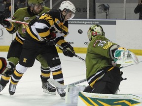 Kingston Frontenacs Darcy Greenaway can't handle the puck in front of Brampton Battalion goalie Matej Machovsky during Ontario Hockey League action at the K-Rock Centre in Kingston on Friday.
IAN MACALPINE/Kingston Whig-Standard/QMI Agency