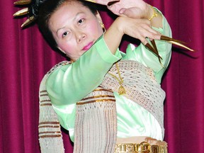 Nita Polsri-Muth, owner of the Thai Gardens in downtown Pembroke, demonstrates a Thai nail dance during the Rural Diversity seminar held at the Germania Club earlier this week. The Thai Gardens was also one of four local restaurants which provided an ethnic lunch for the event.