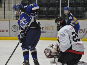 Caps goalie Brendan Schaan looks through a screen during a 5-4 shootout loss to the Norman Northstars Sunday. (Kevin Hirschfield/Portage Daily Graphic/QMI AGENCY)