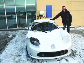 Christopher Misch, the vice president of sales for Sun Country Highway, parked the Tesla Model S at the Best Western Lakeside Inn on Sunday.
JON THOMPSON/Kenora Daily MIner and News
