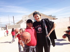 Starman poses with one of the Mexican children she coached and played basketball with. 
Submitted