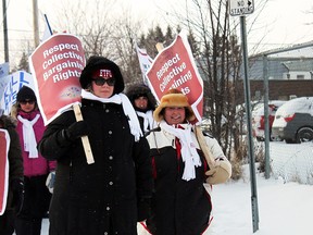 Public elementary school teachers took to the streets on Monday, abandoning their classrooms in a quest to have their voices heard in Queen's Park. The walk-out came in reaction to provincial Bill 115, which strips Ontario teachers of the right to strike. A picket was held outside the offices of District School Board Ontario North East in Timmins.