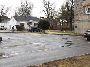 The parking lot between Morris and McNeill Halls is the location for one of two new student residences announced by Queen's University. (Michael Lea The Whig-Standard)