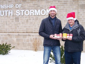 Sean Clarke and Joe Harty, elected representatives for the Sault Crew, stand in front of the South Stormont Community Centre/Town Hall where they will be hosting hay wagon rides for members of the public for a donation of a non-perishable food item to benefit less fortunate members of Long Sault.
Staff photo/ERIKA GLASBERG