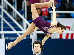 Meagan Duhamel and Eric Radford of Canada perform during the pairs free skating competition at the ISU Grand Prix of Figure Skating Final in Sochi December 8, 2012.  REUTERS/Grigory Dukor