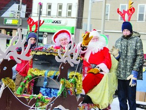 Santa and Mrs. Claus and their reindeer wave to the crowd during the Eganville Santa Claus parade Sunday afternoon. It attracted close to 40 floats and a number of fire departments from Bonnechere Valley and the surrounding area. For more community, please visit our website photo gallery at www.thedailyobserver.ca.