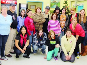 Taking part in the fundraiser for The Grind Salvation Army youth centre Saturday at B’s Cafe were (front from left) Amanda Wilson, Teneya Shires, Hope Thomas and Bailey Davidson. In the back were (from left) Debbie Waito, Dave Waito, Elisha Kinnear, Kaylee Severin, Jenna-Marie Cyr, Robert Kent, Angela Kinnear, Jess Gagnon, Jacinta Kinnear, Alix Huard, Jessie Gardiner and Janna DesRoches. For more community photos, please visit our website photo gallery at www.thedailyobserver.ca.