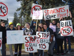 Students at West Elgin Secondary School grabbed signs and walked out of class Tuesday to protest Bill 115 and the fact it has cancelled their prom and all other extra curricular activities.