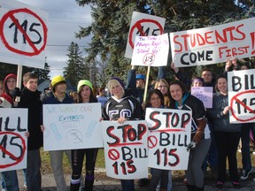 Students at West Elgin Secondary School grabbed signs and walked out of class Tuesday to protest Bill 115 and the suspension of extracurricular activities. (PATRICK BRENNAN, For the Times-Journal)