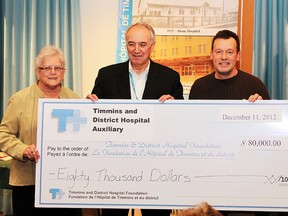 The Timmins and District Hospital Foundation accepted a generous donation from the hospital's Auxiliary on Tuesday afternoon. Throughout 2012, the auxiliary raised $80,000 for equipment purchases at the hospital. This brings the grand total of Auxiliary donations since 1996 to $1,084,000. From left are T&DH Auxiliary Treasurer Annette Gélinas, TDH president and CEO Roger Walker, TDH Foundation vice-chairman Michel Lessard and  TDH Auxiliary president John Duclos.